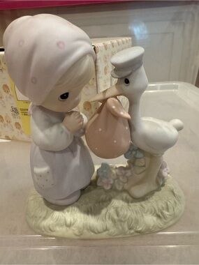 Precious Moments Pastel Pink and Cream Girl with Stork Figurine
